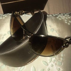 Authentic Gucci Sunglasses W/ Case.